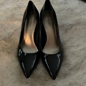 Black patent leather pumps